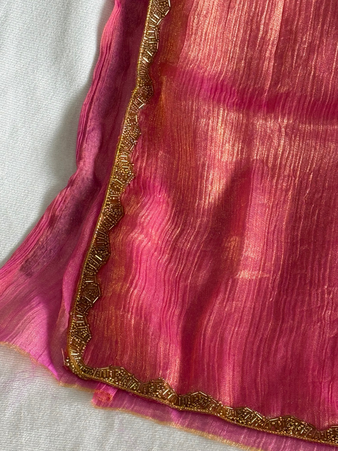 Pink chiffon saree with golden border