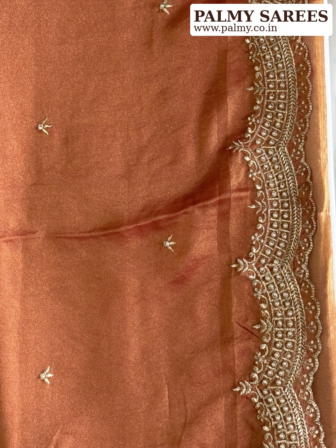 rust colour wedding guest saree